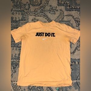 light orange nike shirt